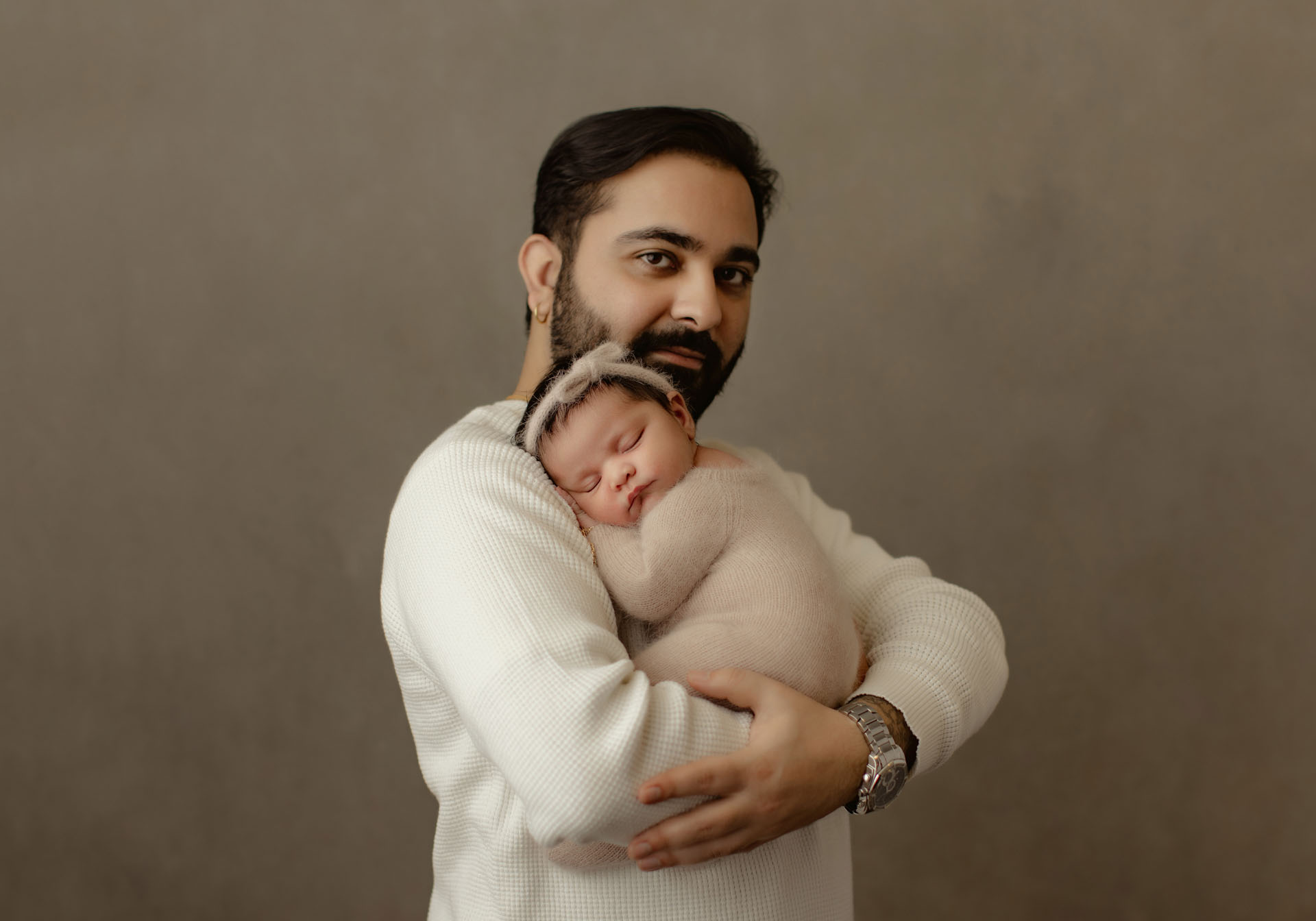 Newborn baby girl with dad portrait