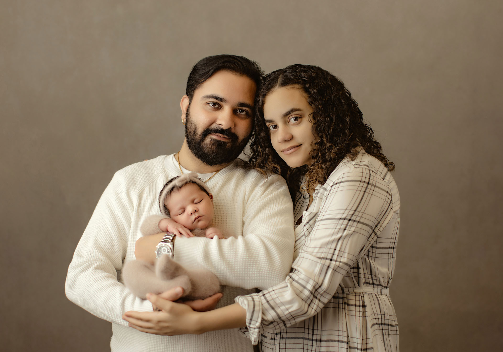 Family portrait with newborn baby girl