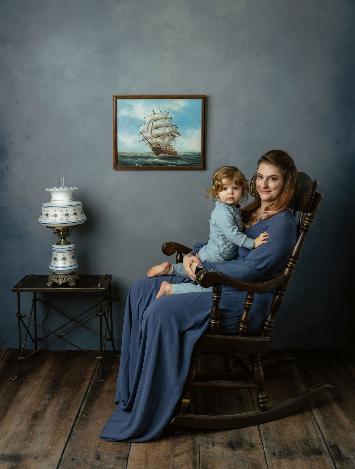 Portrait of mom and toddler in rocking chair