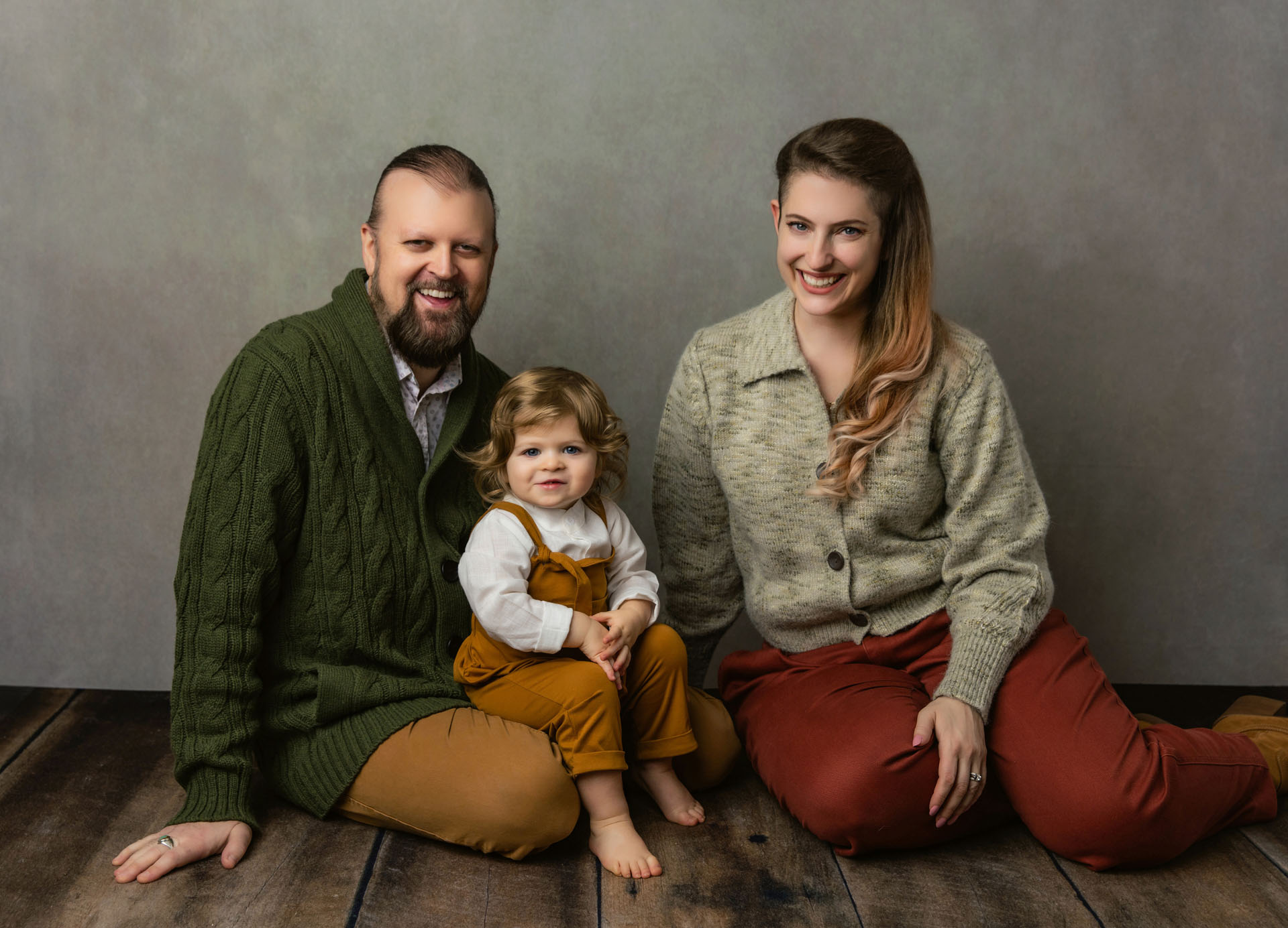 Portrait of mom, dad and toddler