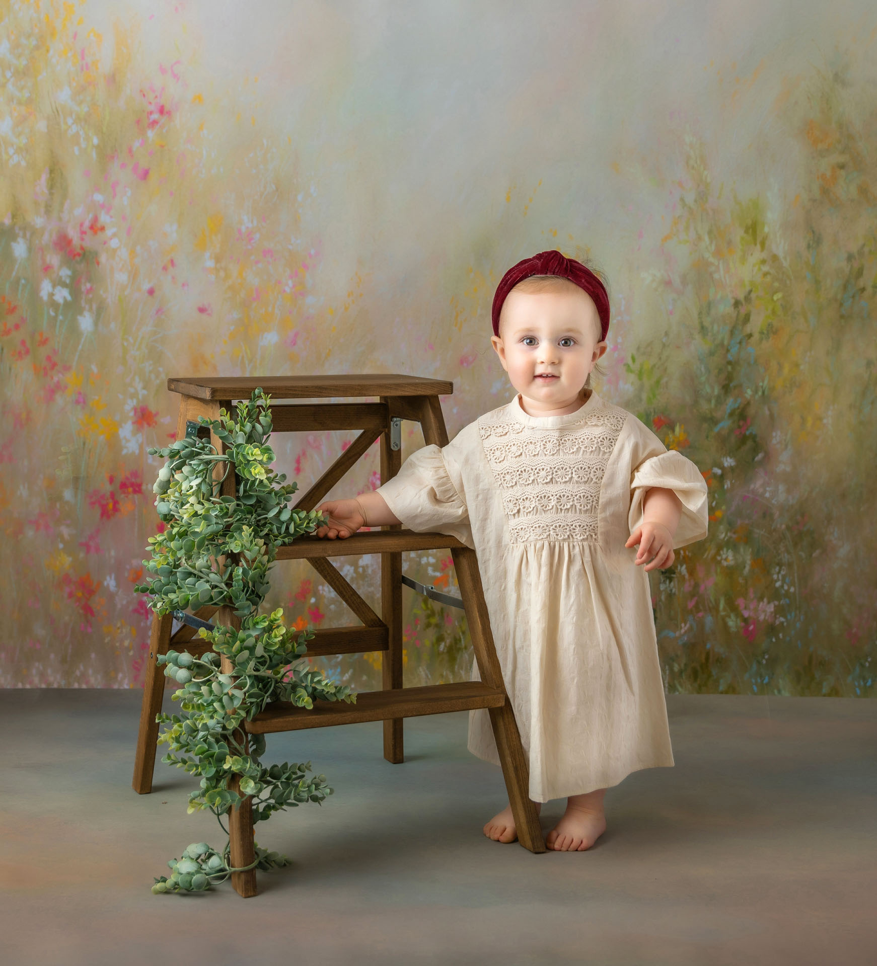 Springtime boho milestone portrait of toddler